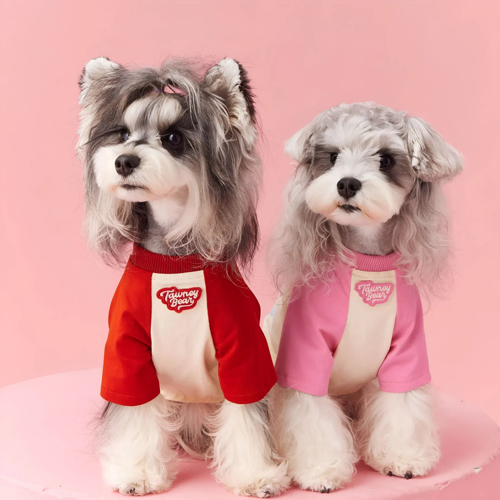 Cotton dog summer clothes in embroidered red and pink colours showing size range XS to XXL