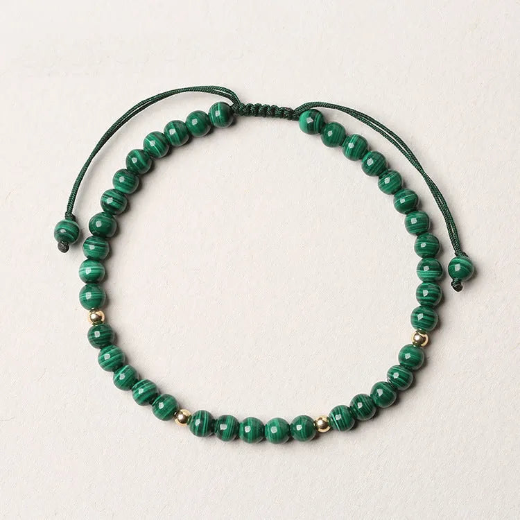 Natural malachite crystal bracelet for women with hand woven golden balls and textured stone beads