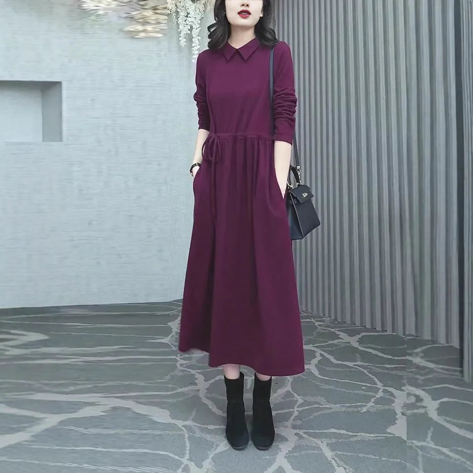 Purplish red women's plus size long sleeve dress with a long skirt for autumn and winter wear.