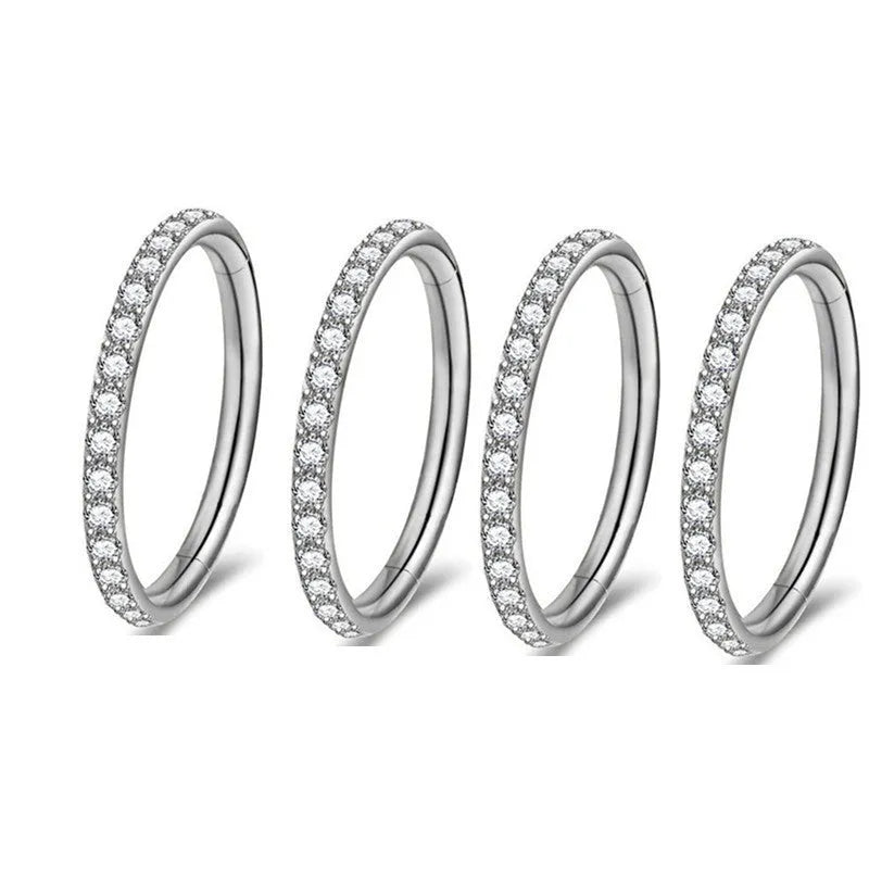 Stainless steel seamless nose ring with diamond front design in gold finish
