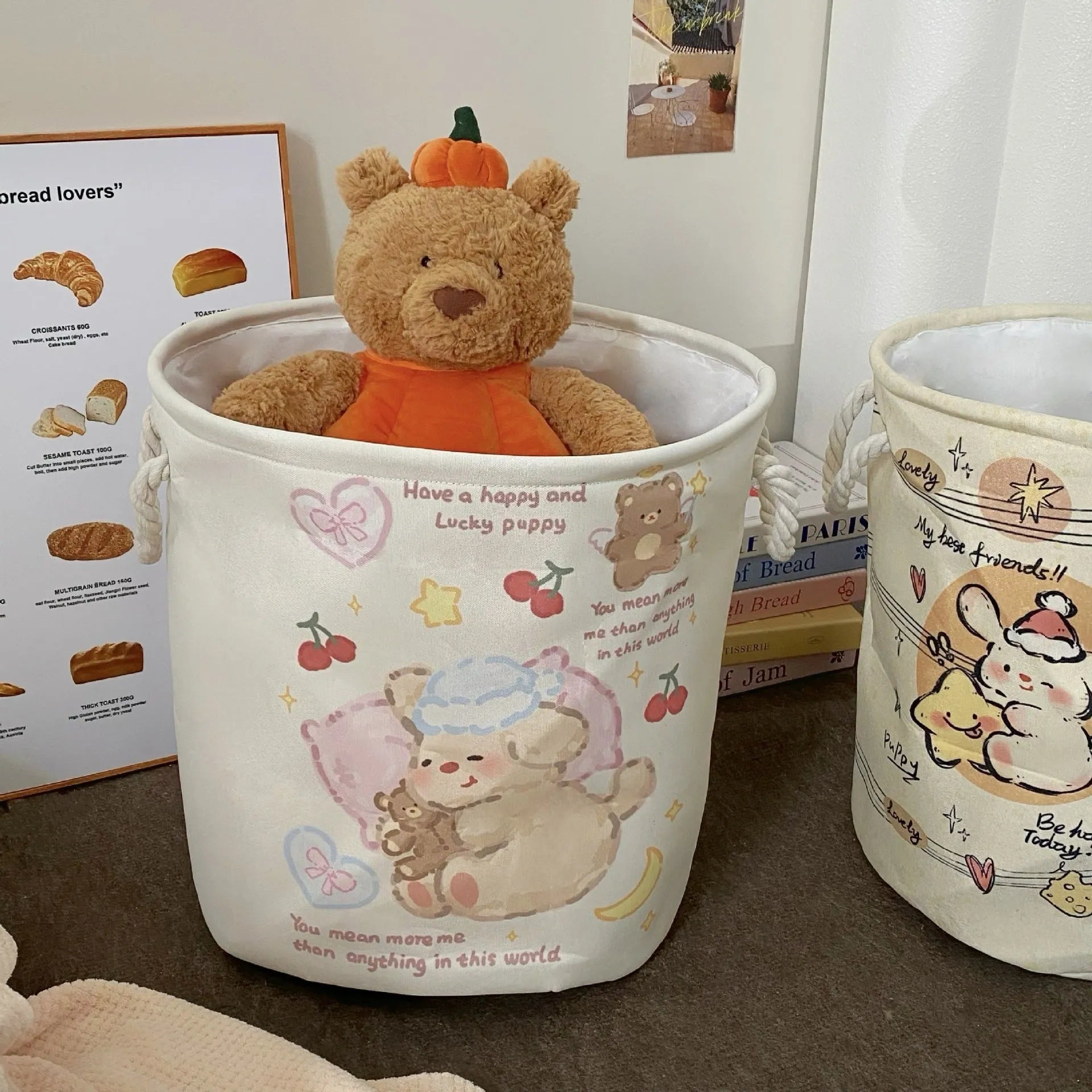 Foldable cotton laundry basket showing one of twelve colour patterns including animal motifs