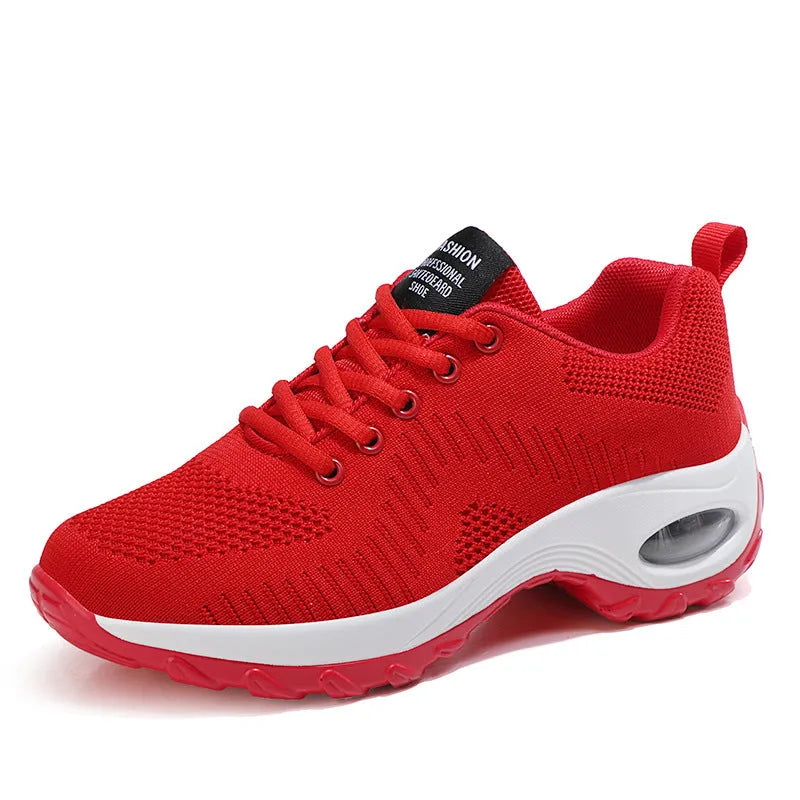 Women's round toe black mesh sneakers with white laces on a flat PU sole.