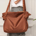 Large capacity shoulder crossbody luggage bag for women in black Oxford cloth with solid colour design