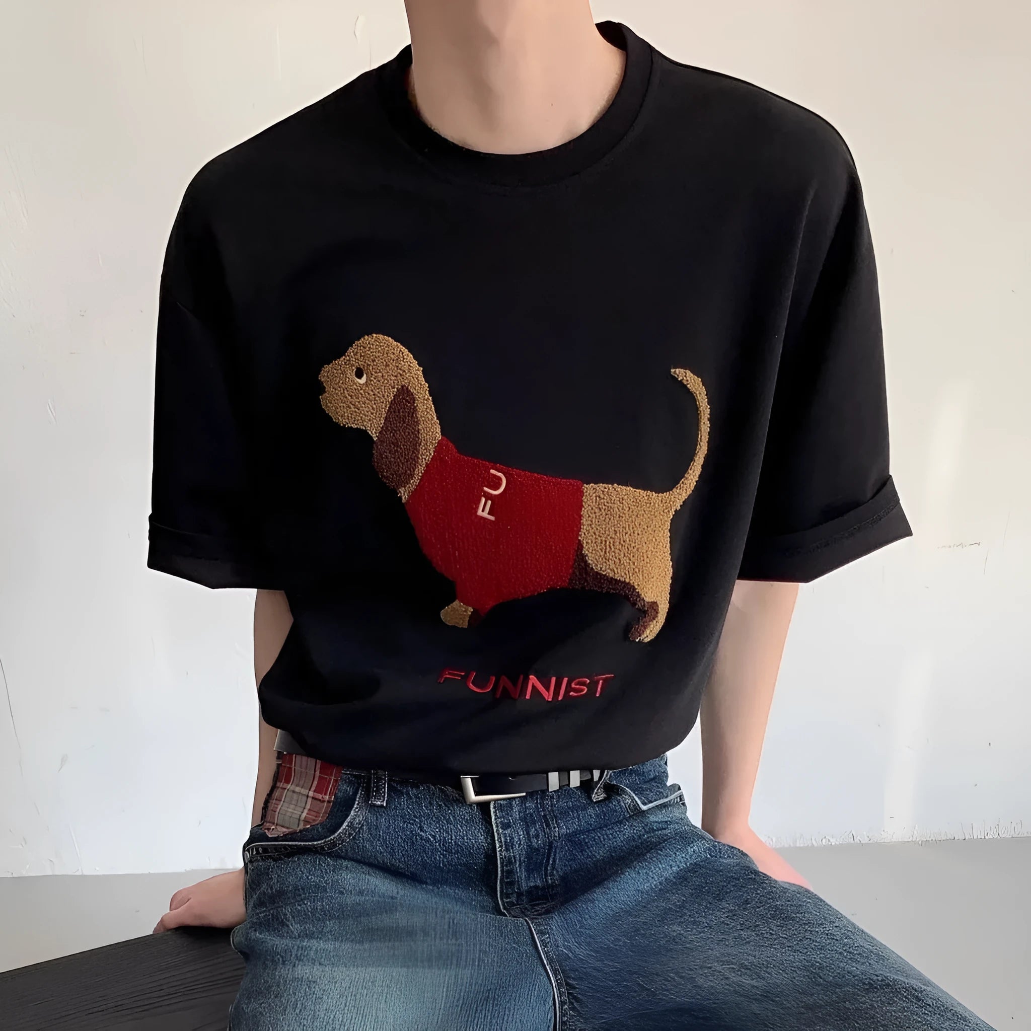 Grey men's short-sleeve cotton T-shirt with an embroidered sausage dog design on the chest.