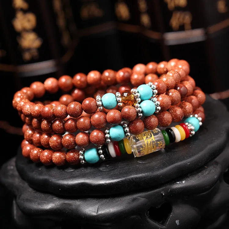 Golden star stone bracelet ornament with 108 nugget pieces and multi-circle design featuring fu character
