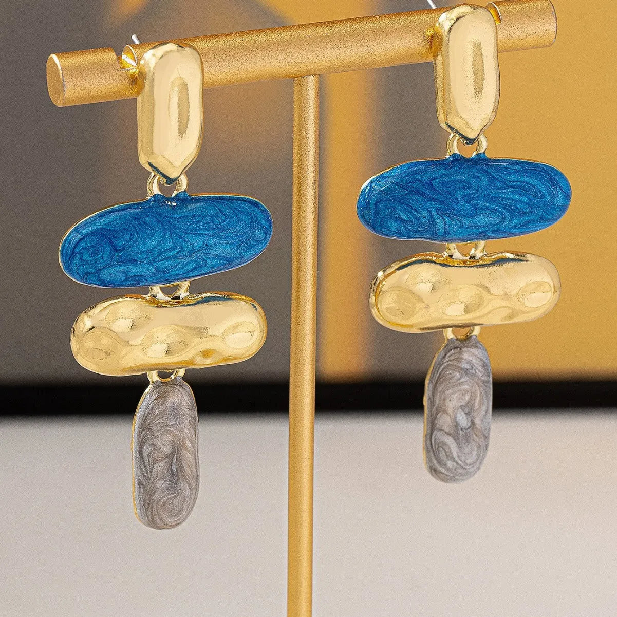 Women's geometric stud earrings with electroplated multicolour finish on zinc alloy