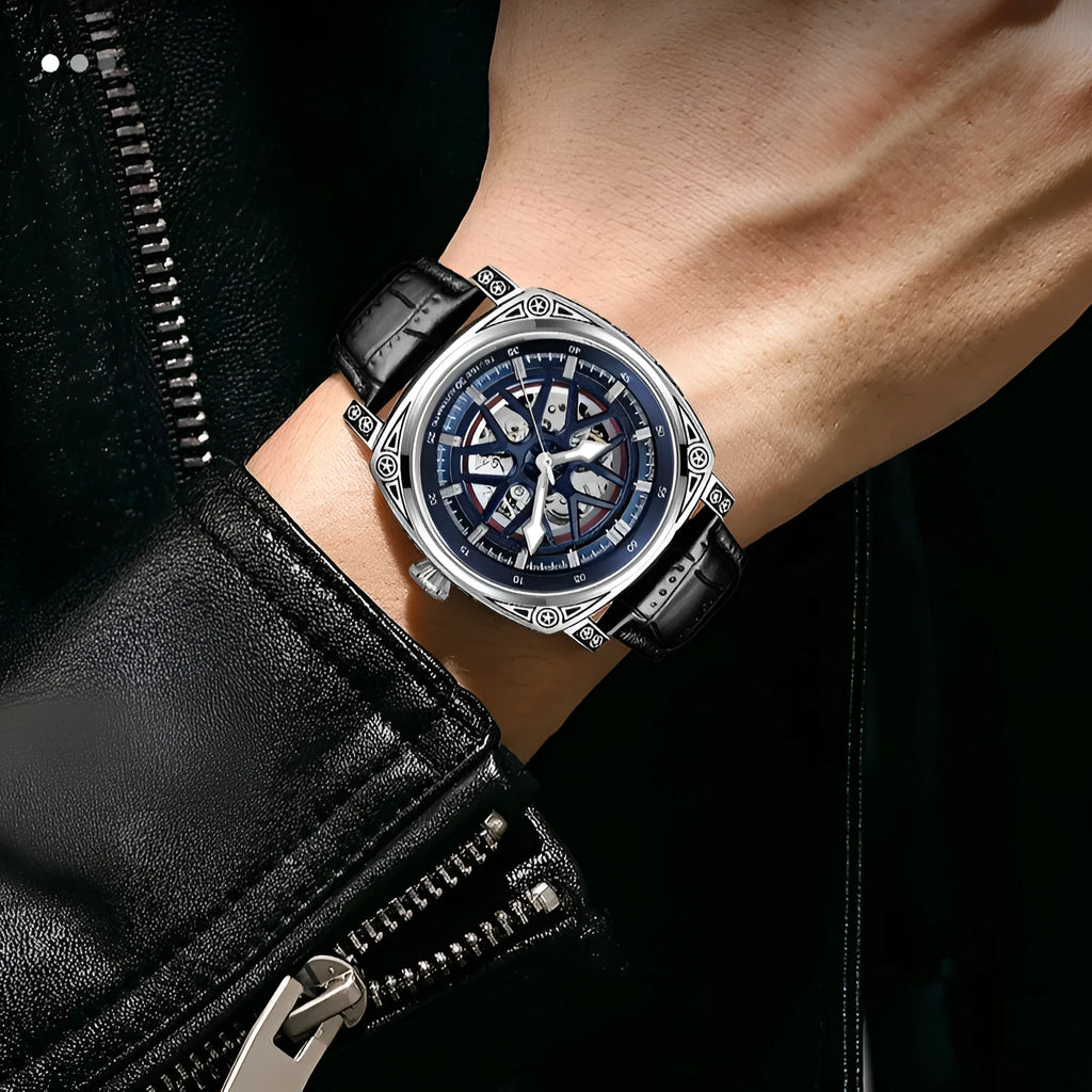 Men's automatic mechanical watch with stainless steel case and blue leather strap showing 14mm thickness