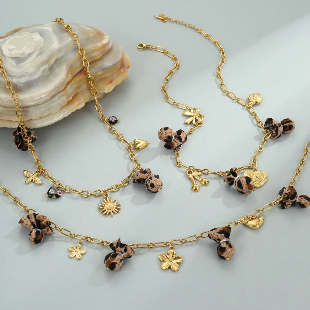 Women's stainless steel necklace with leopard pendant and love heart flowers, 18K gold electroplated geometric design