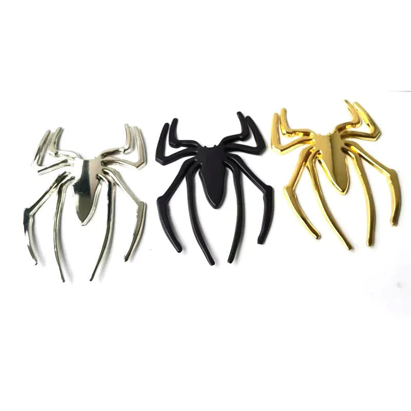 Zinc alloy 3D spider bumper sticker in metallic colours on a car bumper.