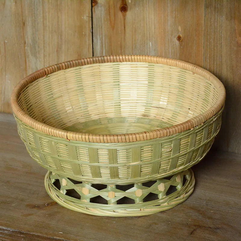 Handmade bamboo storage basket with woven construction in three size options