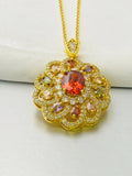 Women's floral pendant necklace with a colourful zircon stone in a gold, champagne gold, or platinum colour metal setting.