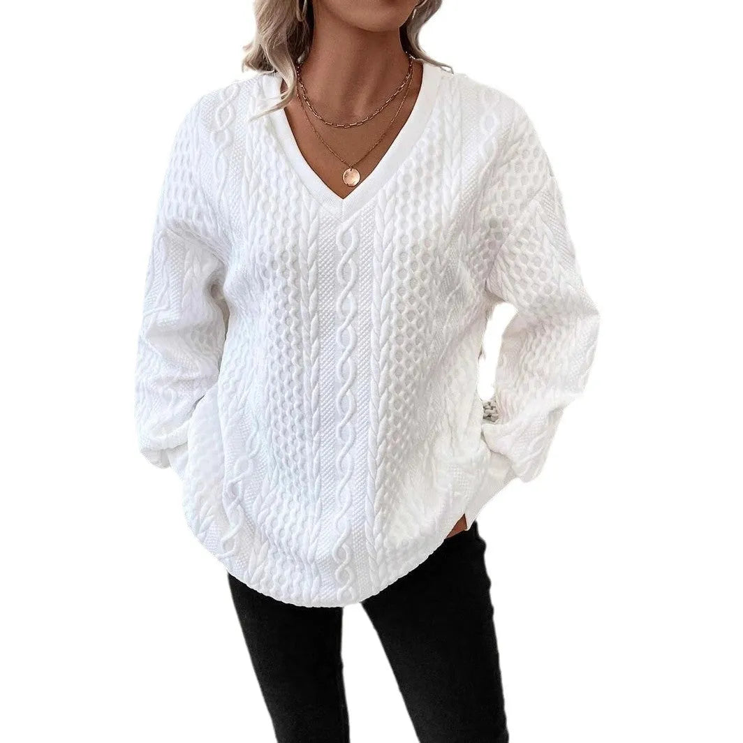 Milk white loose fit long sleeve t-shirt with a subtle 3D pattern on a casual model