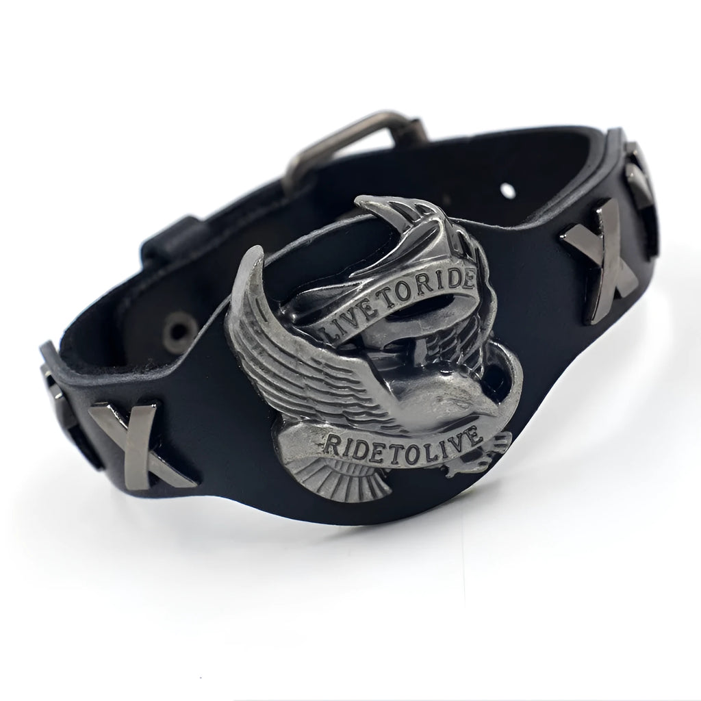 Black leather bracelet with geometric eagle watch-button clasp showing tapered 1.7-3.8cm width