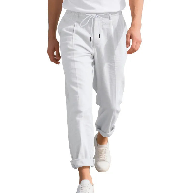 Men's light grey linen casual trousers with a loose straight leg and drawstring waist