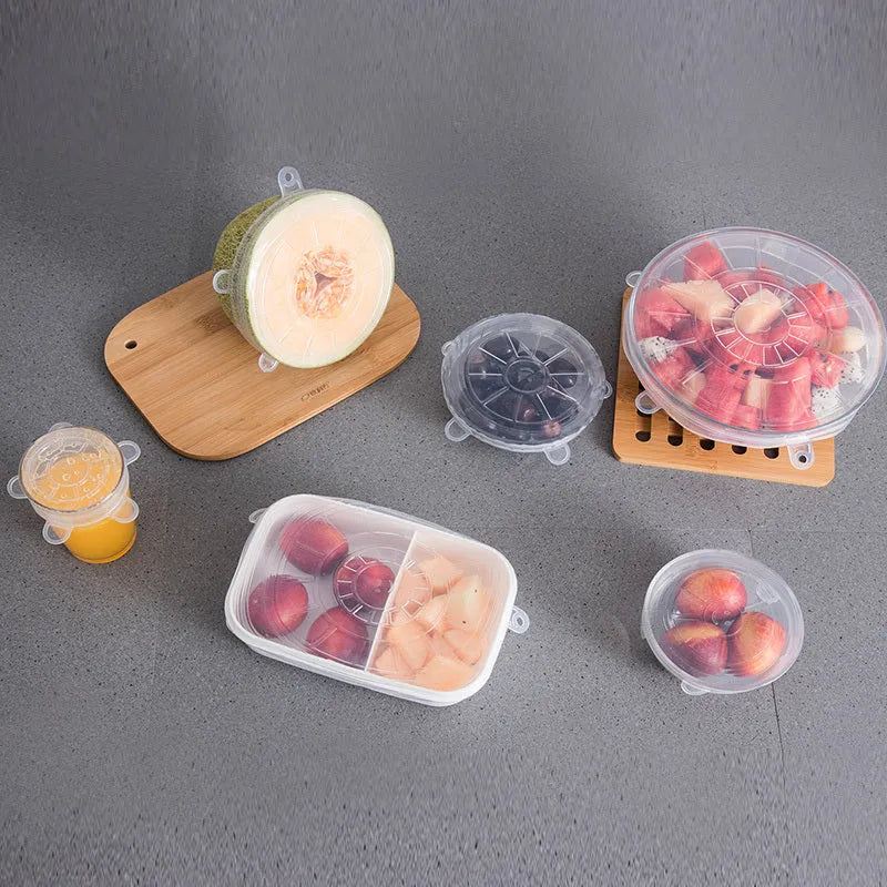 6 silicone food stretch lids in assorted sizes on a kitchen counter for fresh-keeping