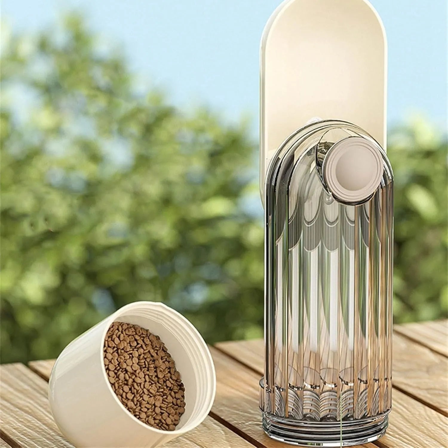 Beige and green foldable dog water bottle with food container, 21.5cm tall with leak-proof design