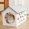 Integrated plastic cat scratch board with sleeping nest, tunnel, and included bell ball toy