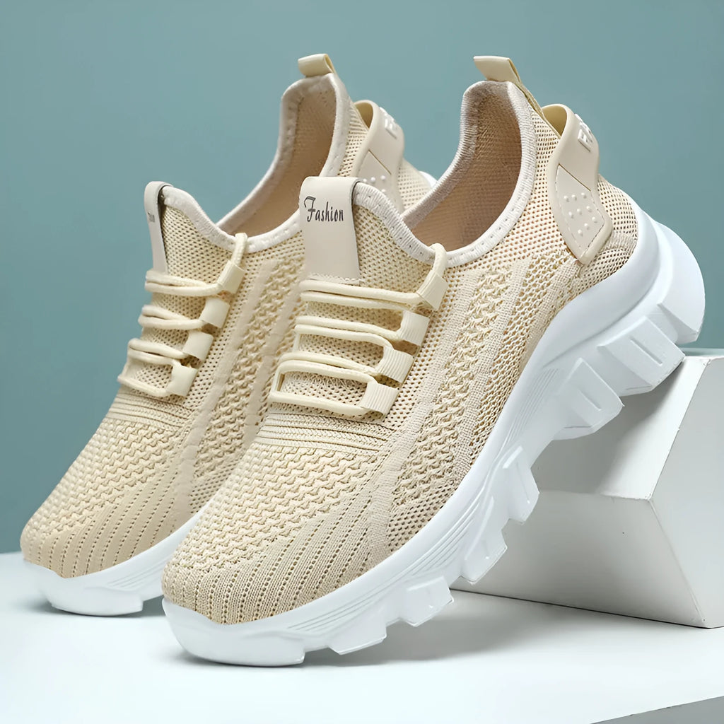 Men's white Flyknit running shoes with thick PVC sole and lace-up front.