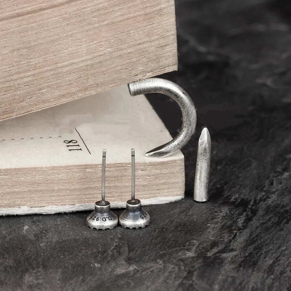Sterling silver punk earrings with retro nail design in straight and curved styles