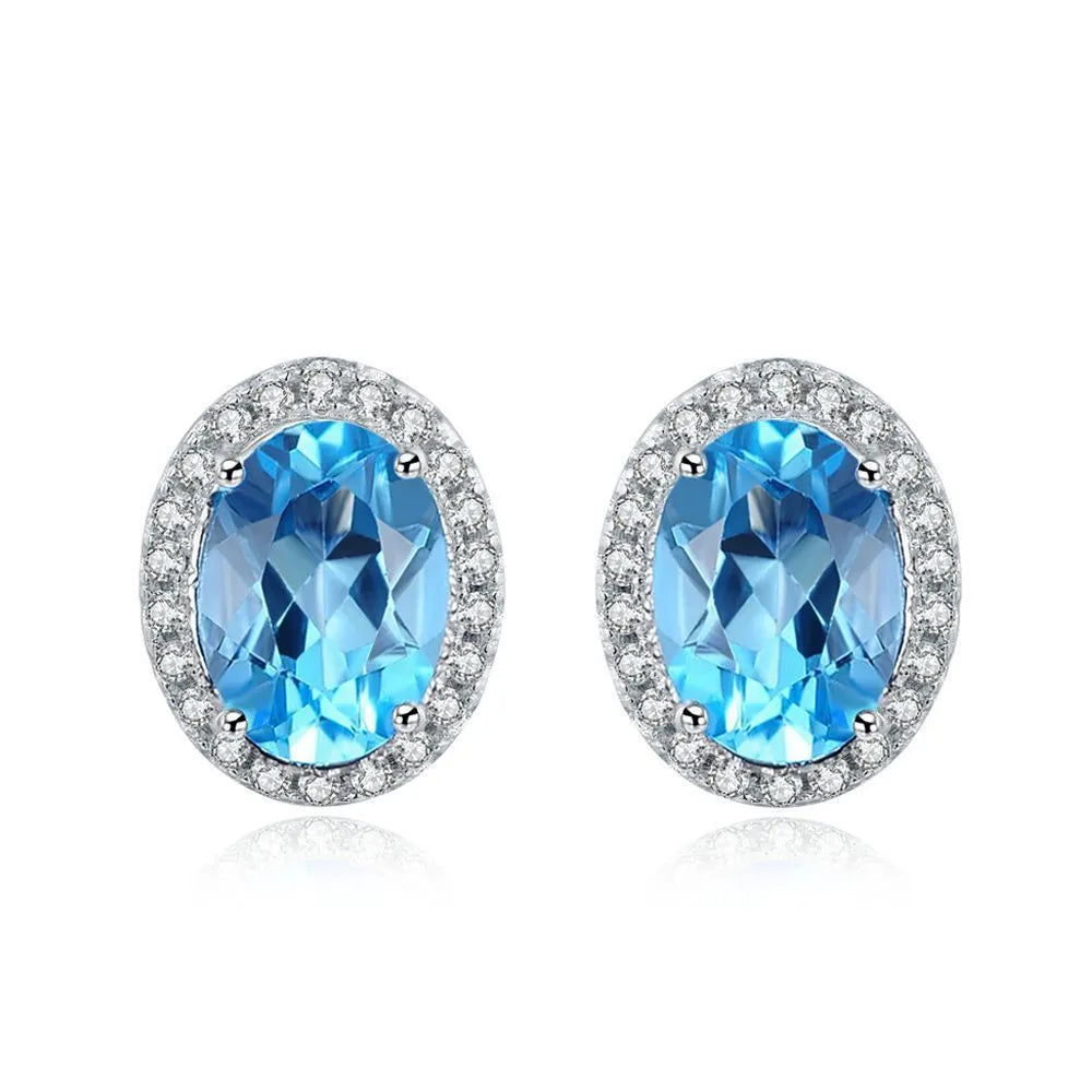 925 sterling silver geometric jewellery set with blue topaz stones including earrings, ring, bracelet and necklace