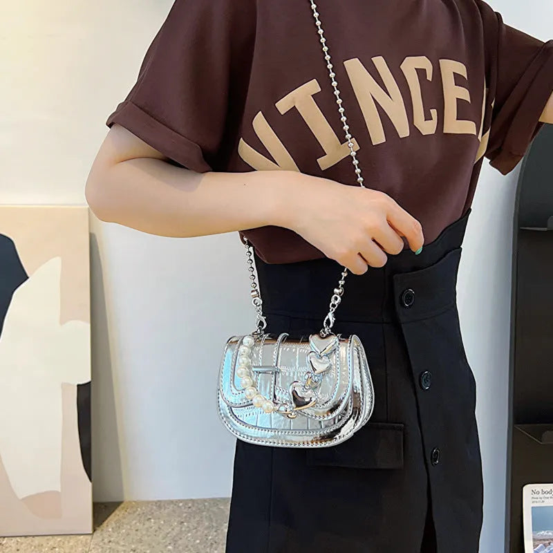 Women's PU leather mini tote crossbody bag showing mobile phone compartment and sandwich pocket