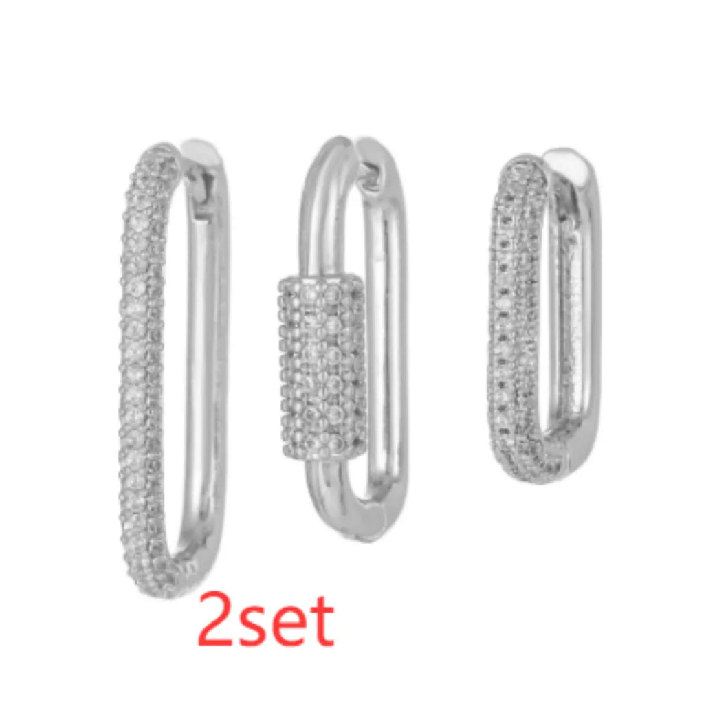 Three geometric ear clips with square design and micro inlaid zircon detailing in gold or white colour options