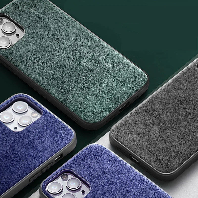 Suede full-cover phone case for iPhone on a dark background, shown in elegant black, dark night green, and dark blue colours.