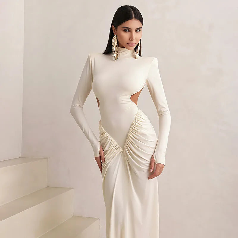 Women's high collar long sleeve backless pleated dress in polyester available in four colours with Asian sizing