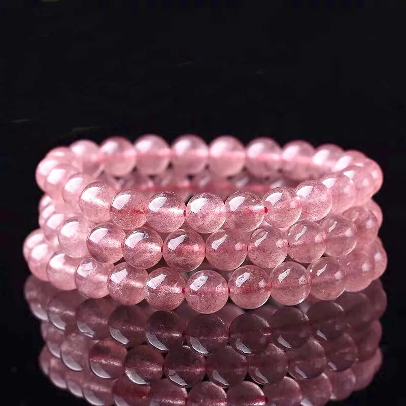 Polished strawberry quartz crystal bracelet for women in 6mm, 8mm and 10mm bead sizes.