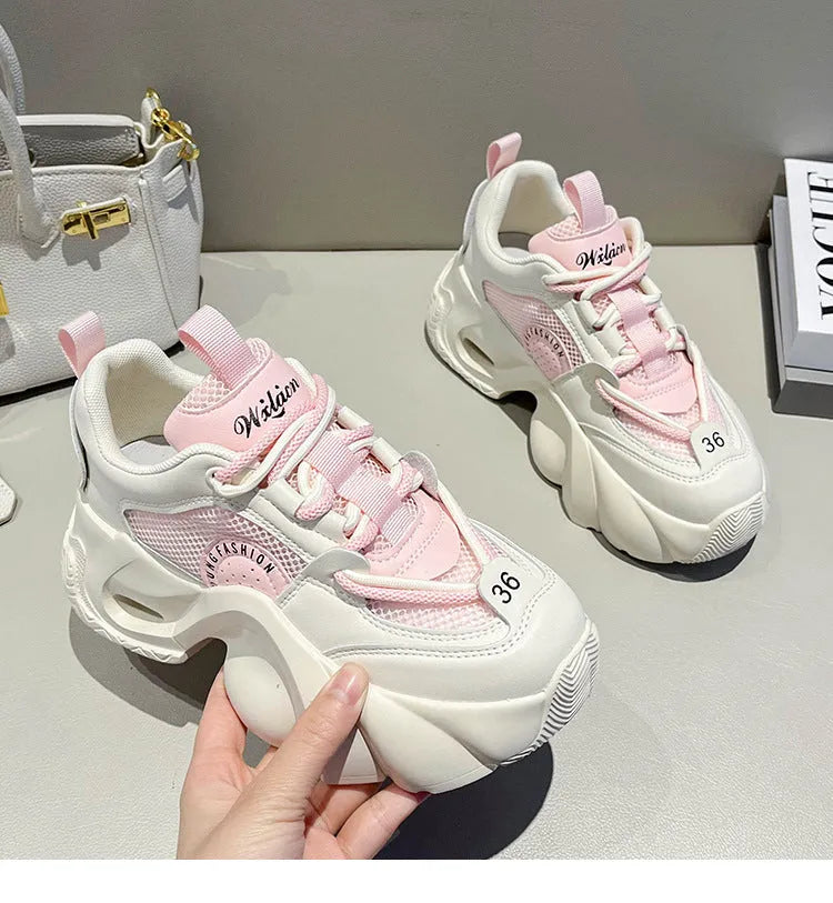 Women's thick sole sneakers with crossover strap detail in pink, black, and beige colour options