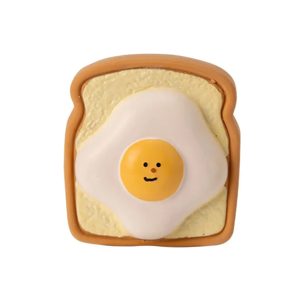 Cute cartoon pattern latex dog toy in egg bread shape, bite resistant squeaky chew toy for puppies, yellow and green