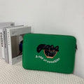 Embroidered laptop sleeve with animal design showing polyester construction and size options