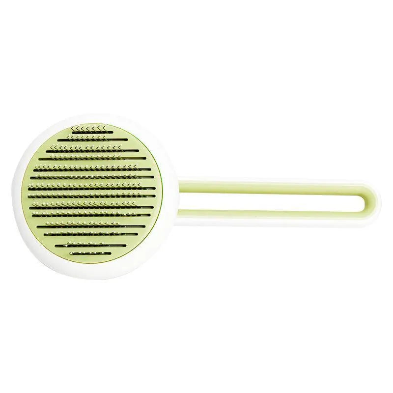 Pet grooming comb with stainless steel teeth, automatic massage, and one-button hair release in blue green and pink
