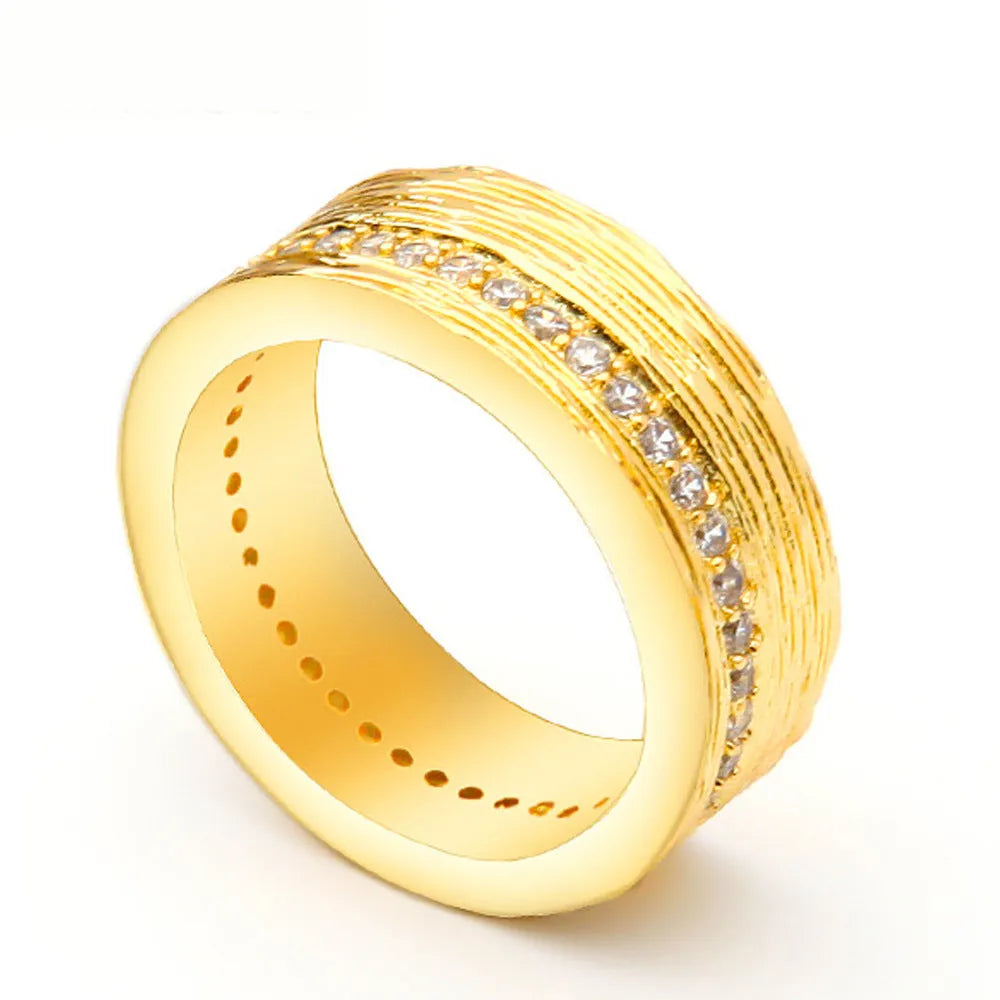 Gold geometric zircon ring for women on a copper base, shown in size 7.