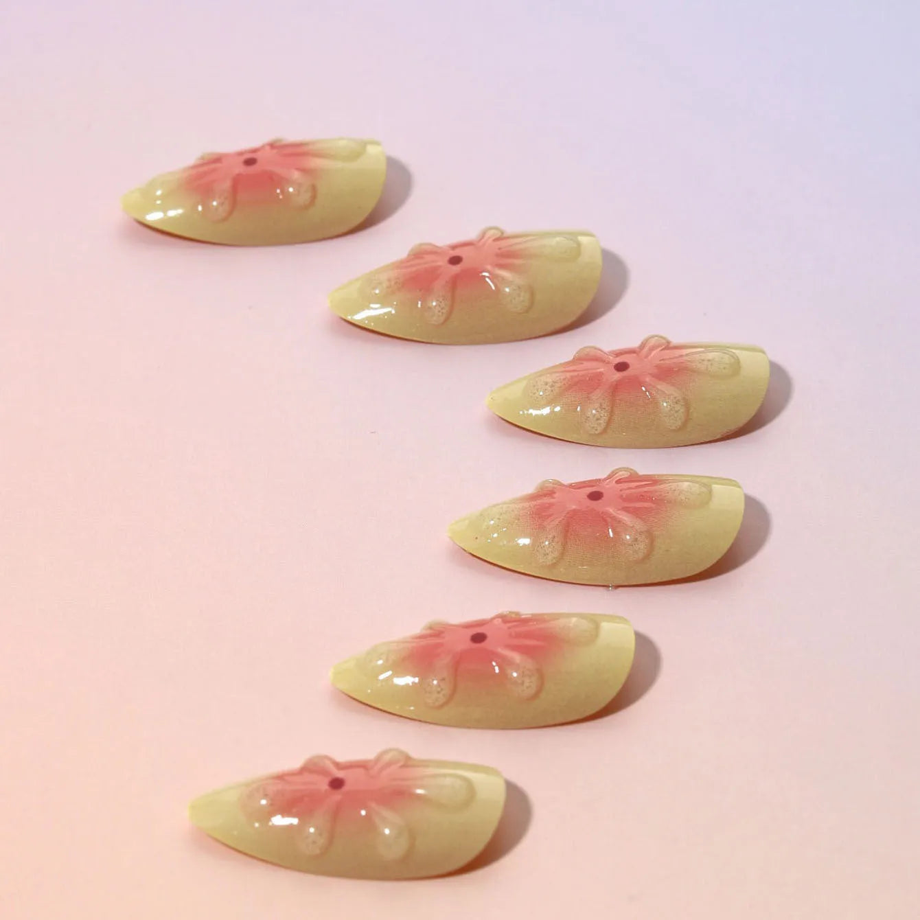 False nails with 3D cartoon flower pattern and detachable plastic armour pieces