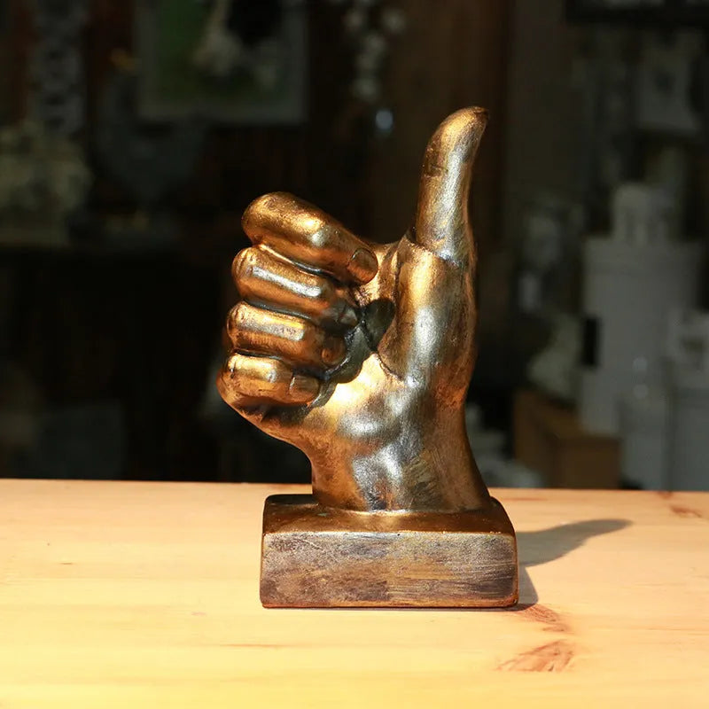 Resin gesture ornament in silver OK hand sign on desktop, blessing home decoration