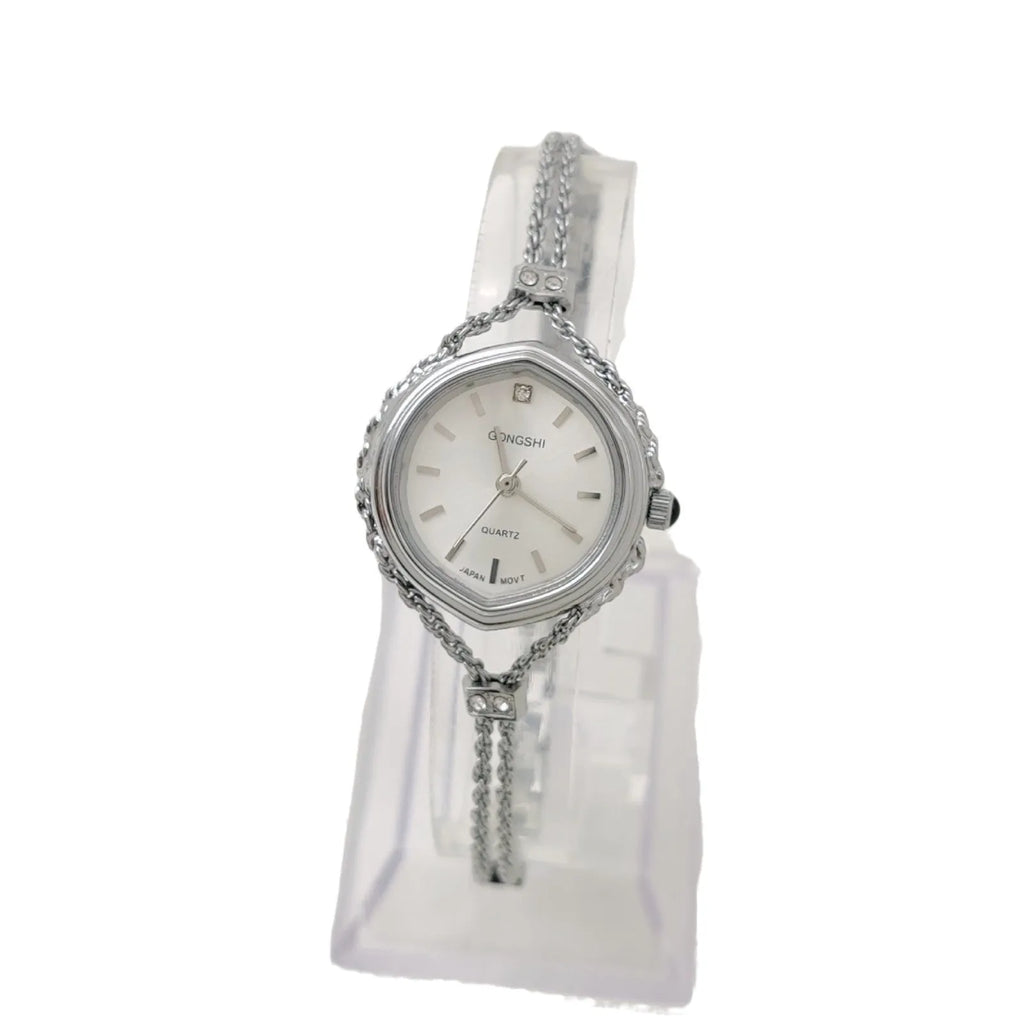 Women's light luxury quartz watch with gold case, 25mm dial, and mineral glass mirror