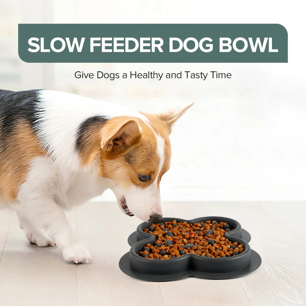 A blue silicone pet licking pad with a textured surface, placed on a wooden floor.