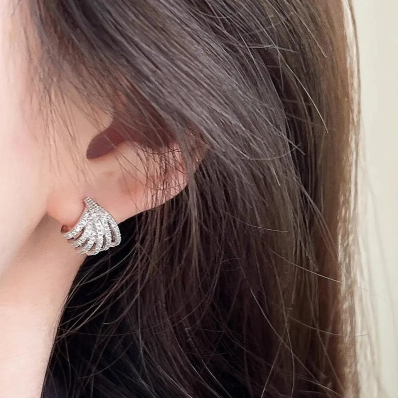Geometric platinum electroplated zircon earrings for women with European and American style design