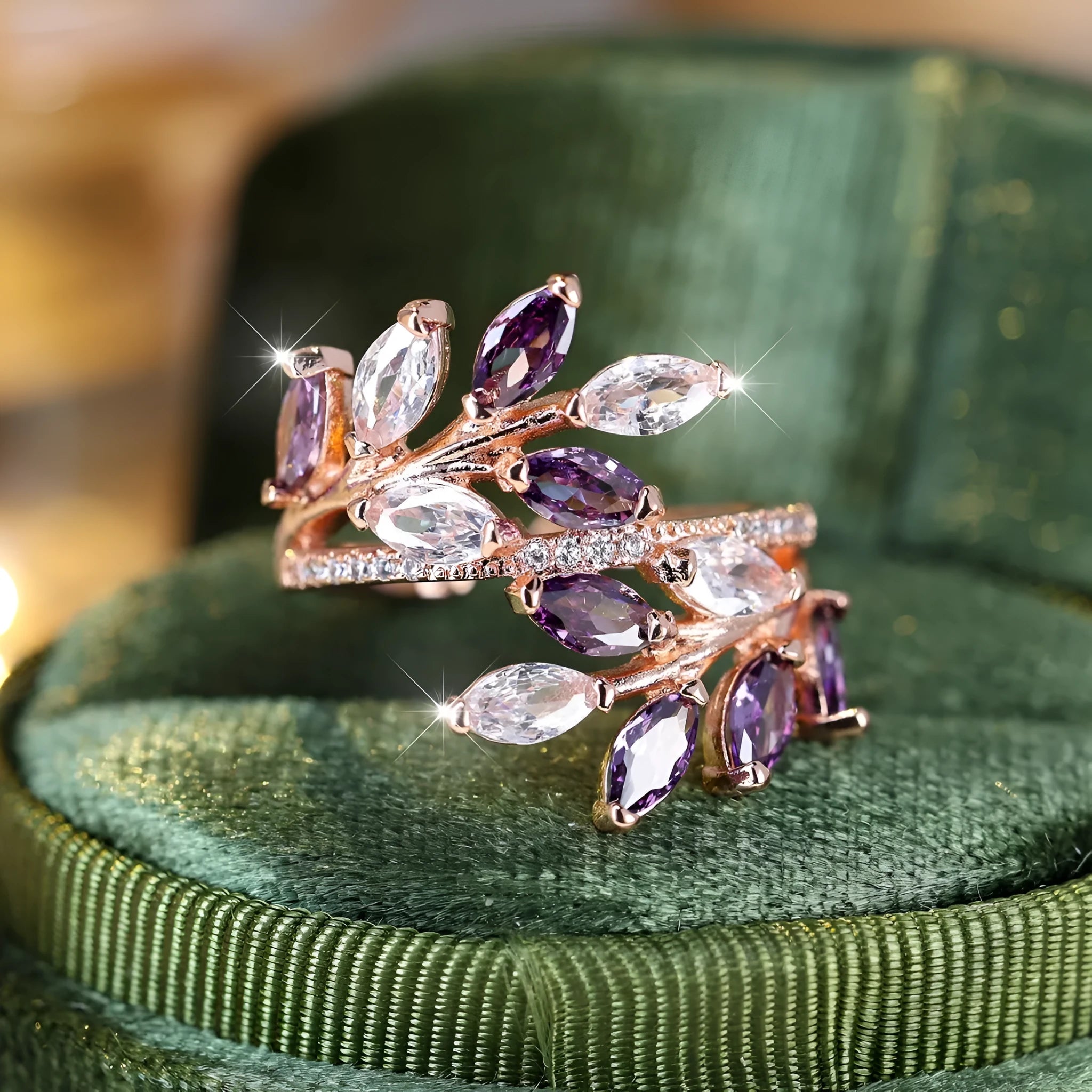 Adjustable copper leaf ring with zircon stones in various colour settings including platinum and rose gold options