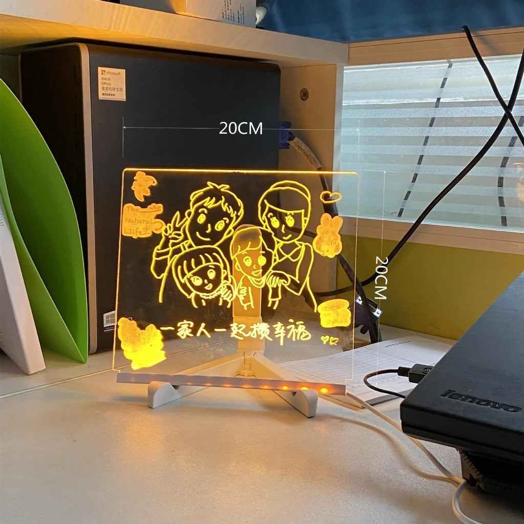 Acrylic DIY note board LED night light with pens on desk, showing written message and soft glow