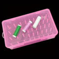 Transparent plastic box with 42 small compartments for organising sewing needles and pins.
