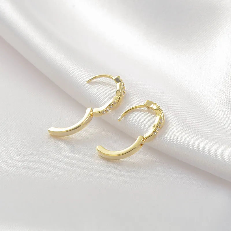 Geometric hemp rope earclip earrings with interwoven design in gold or silver colour options