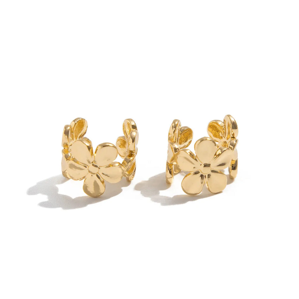 Gold starfish and conch shell earrings for women with animal zodiac designs