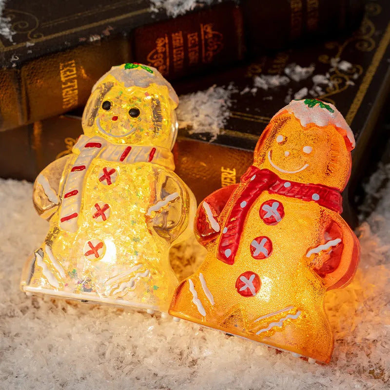 Glowing gingerbread man Christmas ornament with LED lights and red scarf