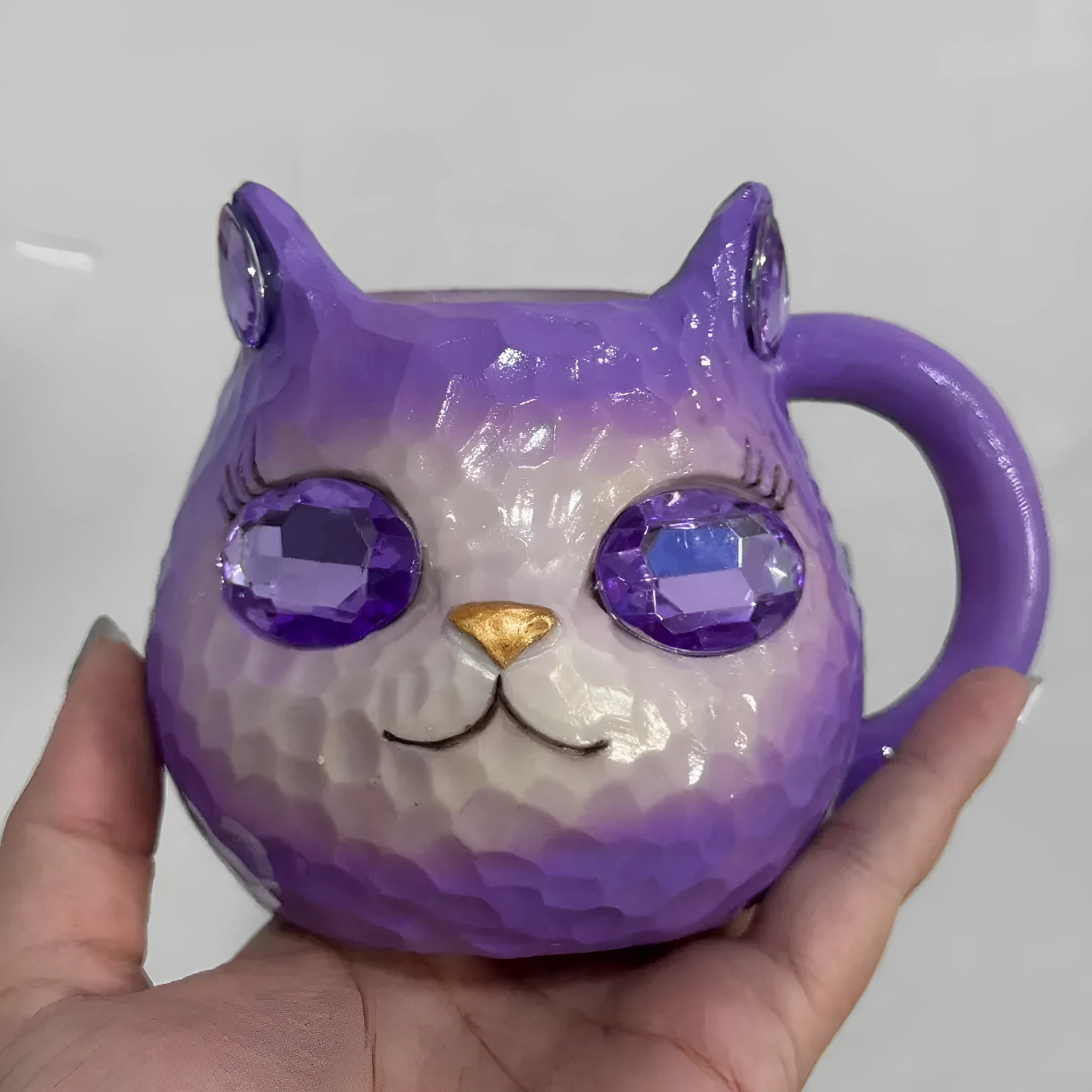 Handmade resin cat craft cup with hand-painted detailing in blue, green, pink, or purple.
