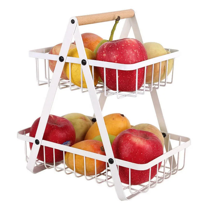 Detachable iron double-layer fruit basket with wooden handle on a kitchen table, black finish