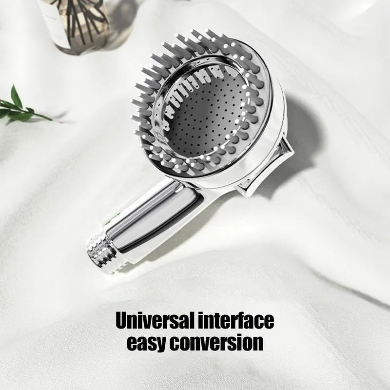 Silver 2 in 1 dog shower attachment with soft silicone comb teeth and ergonomic grip on white background
