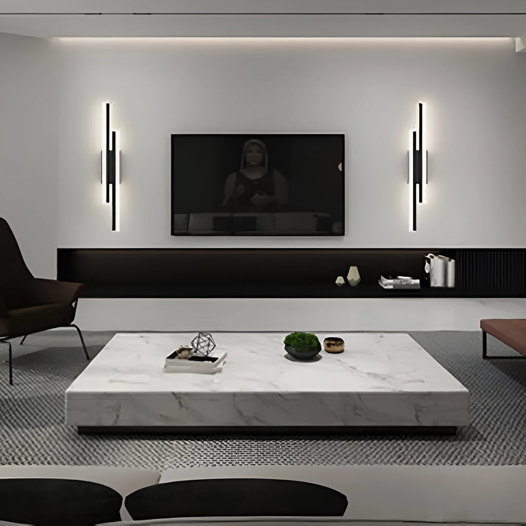 Scandinavian minimalist LED wall light with acrylic shade on black metal arm.