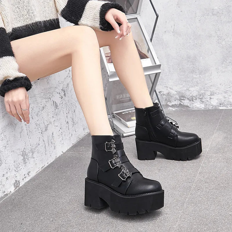 Black women's punk Martin boots with bat buckle, thick heel, and side zipper.